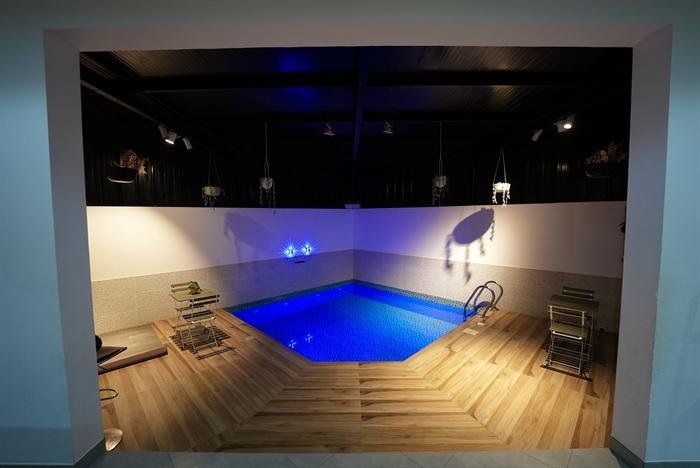 Indoor pool wide angle at night
