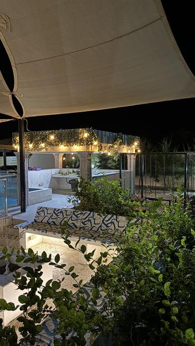 Outdoor majlis lounge seating with patterned cushions
